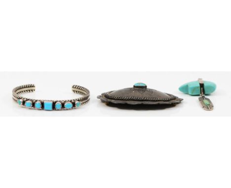 A Native American silver and turquoise feather pendant, 64mm, a turquoise bangle and a brooch (3), 58gm