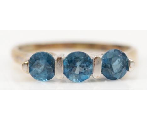 A 9ct white gold blue topaz three stone ring, S 1/2, 3.3g