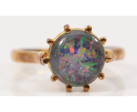 A 9ct gold opal triplet solitaire ring, 8mm diameter opal, G, 1.8g