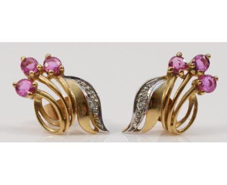 A pair of 9ct gold diamond and ruby earrings with scroll backs, 15mm length, 1.6g