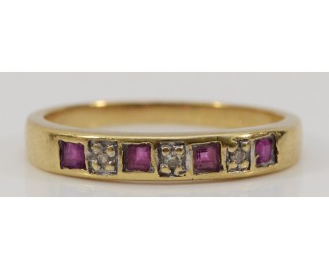 A 9ct gold ruby and diamond half eternity ring, N 1/2, 2.1g