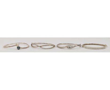 A silver and CZ hinged bangle, a diamond set silver crossover bangle and two other 925 silver bangles, 59gm