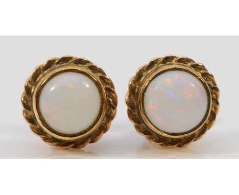A pair of 9ct gold opal earrings with scroll backs, 1.3g