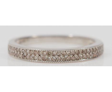 A 9ct white gold diamond half eternity ring, K, 1.9g