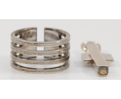 Gucci, a silver band ring, signed, Italian hallmarks, M and a Gucci silver pendant, 11gm