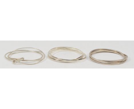 A silver triple interwoven bangle and two 925 examples, 58gm