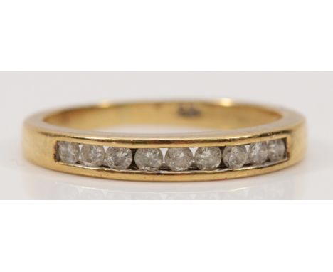 A 9ct gold channel set diamond half eternity ring, J, 1.8g