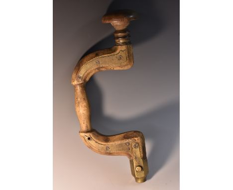 Tools - a 19th century brass-mounted beech carpenter's brace, by Thomas Ibbotson & Co, Sheffield, 35cm long 