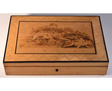 A Regency pyrography rectangular playing card box, hinged cover decorated with hunting dogs, enclosing an arrangement of pape