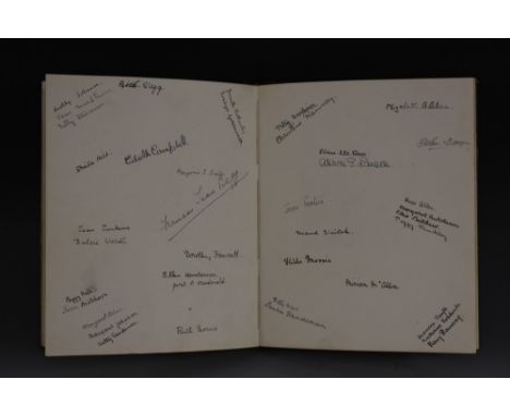 An early 20th century green morocco commonplace book or album, illustrated with various children's cartoons and illustrations