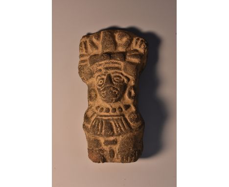 A South American clay votive figure, modelled with stylized Pre-Columbian figures, 11cm long 
