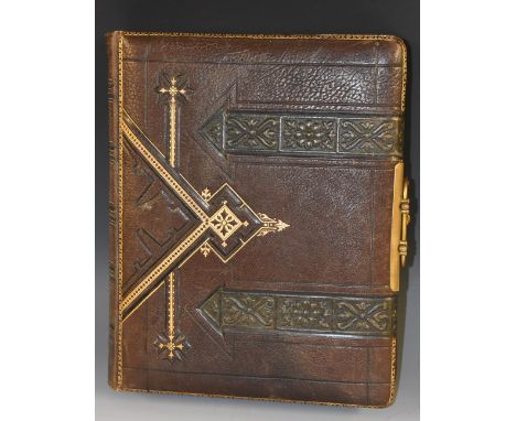 Photography - a Victorian tooled and gilt leather album, containing various portrait photographs and cabinet cards, mainly Bi