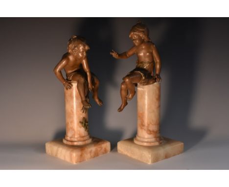 French School (early 20th century), a pair of cold painted spelter figures, of a young boy and girl, posed playfully, alabast
