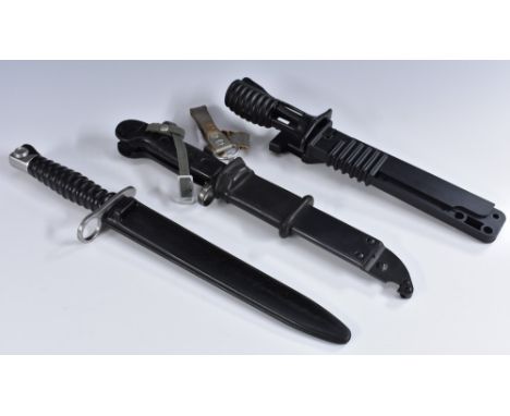 An SA80 bayonet, 18cm blade, high-impact plastic scabbard, 29.5cm long overall; others (3)