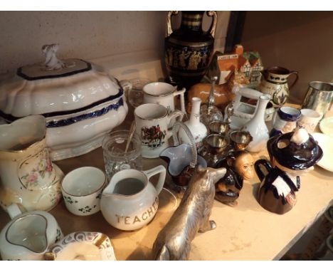 Shelf of mixed items vases ceramics including cheese dish chimps metal dog thatcher jug etc 