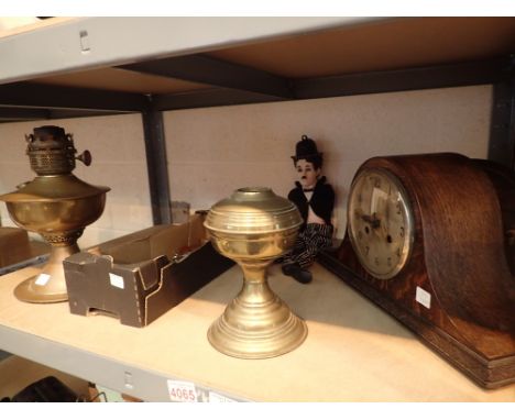 Chiming oak cased clock brass oil lamp base with burner collection of corkscrews and Charlie Chaplin puppet
