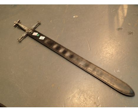 Replica sword with cross decorated hilt in leather scabbard 