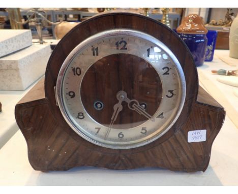 1950 mantel clock with walnut case and key and pendulum 
