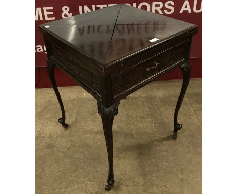 An Edward VII mahogany fold over envelope card table 
