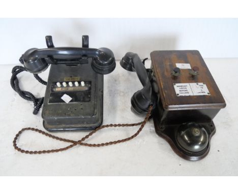 A wooden two button signal box telephone with enamel plate, bell and bakelite handset and a metal desktop five-button predial