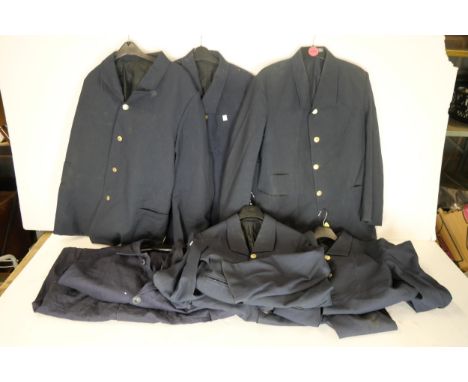 Six British Rail uniform tunics and a long workshop foreman's coat. 