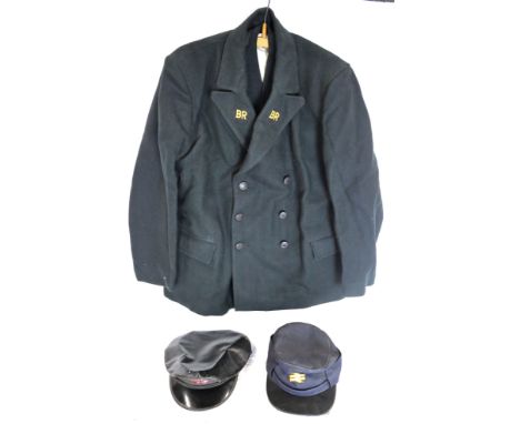 A British Railways waistcoat, jacket and driver's hat, one other hat (both with badges).