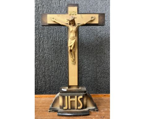 A French beech and brass effect crucifix 