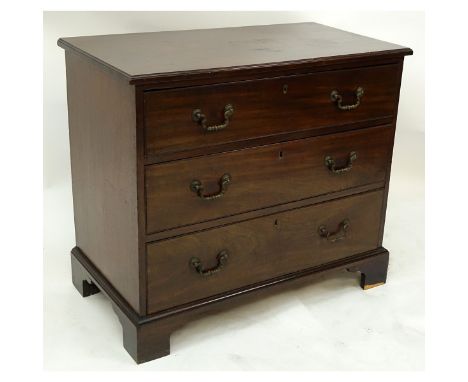 19th Century English Georgian Mahogany Chest of Drawers/Commode. Three large sliding drawers with bracket feet. Scratches to 