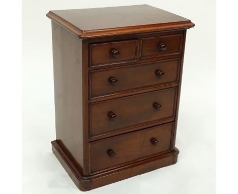 Antique English Miniature Chest of Drawers. Some losses to molding, wear to varnish, light scuffs otherwise good condition. M