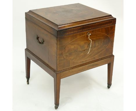 English George III Flame Mahogany Inlaid Cellarette on Casters. Lined interior, stands on squared tapering legs, key included