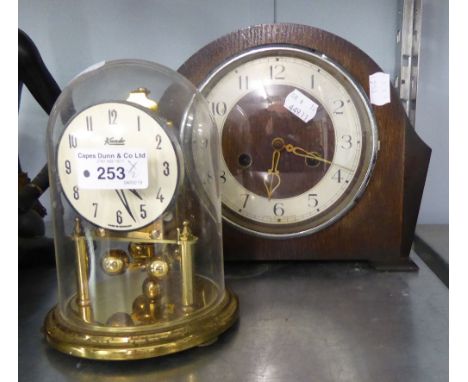 KUNDO ANNIVERSARY CLOCK WITH PLASTIC DOME SHADE AND A SMITH'S OAK STRIKING MANTEL CLOCK (2) 