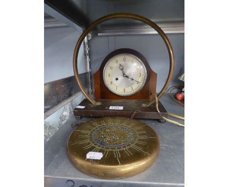 A BRASS DINNER GONG ON OAK OBLONG BASE AND THE BEATER AND AN OAK MANTEL CLOCK WITH STRIKING MOVEMENT 
