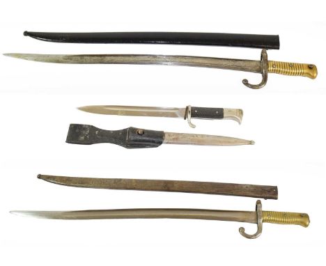 Two French M1866 Chassepot Yataghan Sword Bayonets, one with blade edge engraved Mre. d'Armes De Chat. 1873, the steel crossg