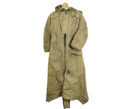 A British Tank Crew Oversuit (Pixie Suit) by Andersons' Rubber Company Ltd., with label to right inner cuff dated 1954, size 