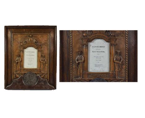 A First World War Memorial Plaque, to Gunner BERNARD ROFFEY, Royal Field Artillery, set to the pediment of a carved oak plaqu