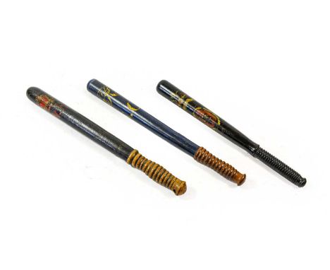 Three Victorian Truncheons: - one in oak, the long rounded cylindrical body painted with a crowned VR cypher in red and cream