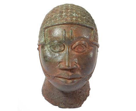 A Benin Small Bronze Head, with tightly coiled coiffure, scarifications to the forehead and cheeks, 17cmCondition report: Wit
