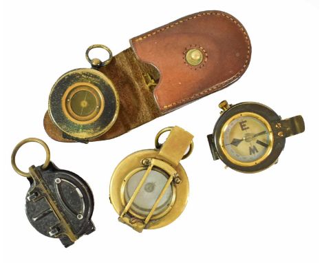 Two Brass Cased Prismatic Compasses, each with mother of pearl register; also, a magnetic pocket compass in black enamelled b