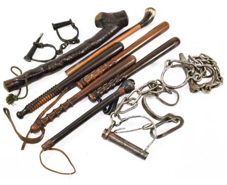 A Rosewood Police Truncheon, with ring turned grip, 41.5cm; also, three walnut police truncheons with ribbed grips and leathe