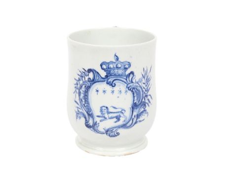 A RARE ARMORIAL LOWESTOFT MUG, CIRCA 1770. The bell-shaped body decorated in underglaze blue with the arms of Carysfort of No
