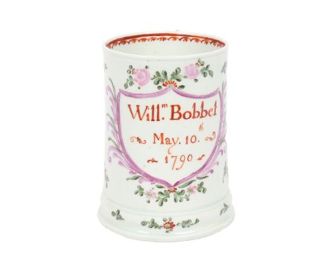 AN IMPORTANT LOWESTOFT INSCRIBED MUG, DATED 1790. Of cylindrical form but very slightly spreading towards the unusual and hea
