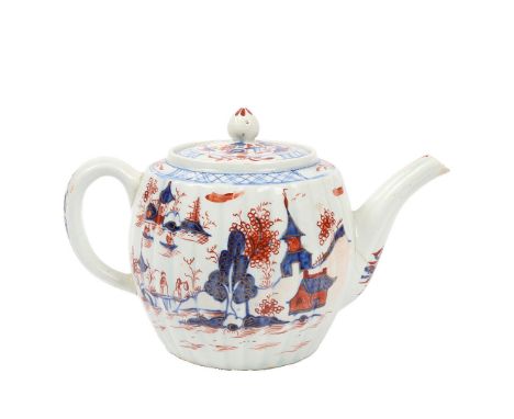 A LOWESTOFT REDGRAVE TYPE PORCELAIN TEAPOT. the fluted body decorated in the "dolls house" pattern, 19.5cm wide across handle