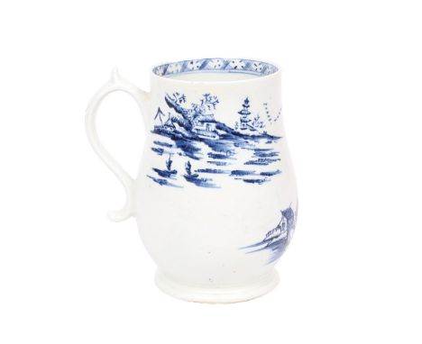 A LOWESTOFT PORCELAIN MUG, CIRCA 1760-62. with bell shaped body and scroll handle, the body transfer decorated with a chinois