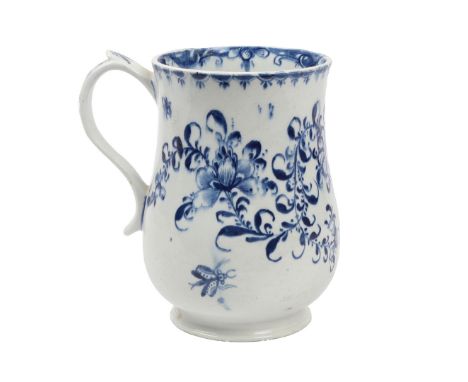 AN EARLY LOWESTOFT LARGE BELL SHAPED MUG, CIRCA 1760-62. Painted with two strutting long-tailed birds between flowering plant