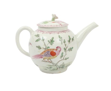 A VERY RARE LOWESTOFT PORCELAIN TEAPOT. polychrome decorated with birds in a landscape, 19cm wide across handle and spout, 12