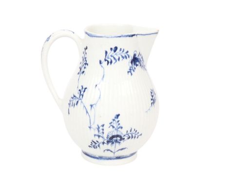 A LOWESTOFT PORCELAIN JUG AND CORRESPONDING WASTER (2). the ribbed body decorated in a variant of the immortelle pattern, pse