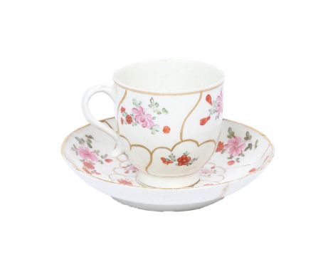 A RARE LOWESTOFT PORCELAIN COFFEE CUP AND SAUCER. circa 1770, decorated in the "Jodrell" pattern with polychrome floral spray