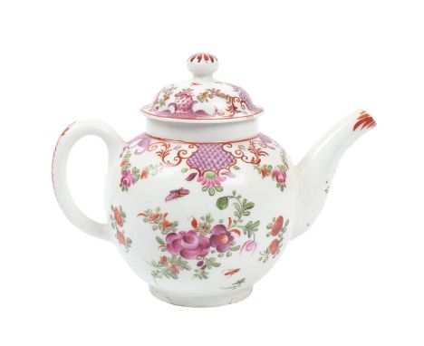 A LOWESTOFT CURTIS PATTERN TEAPOT. with purple scale, polychrome foliate spray and butterfly decoration, 19cm wide across han