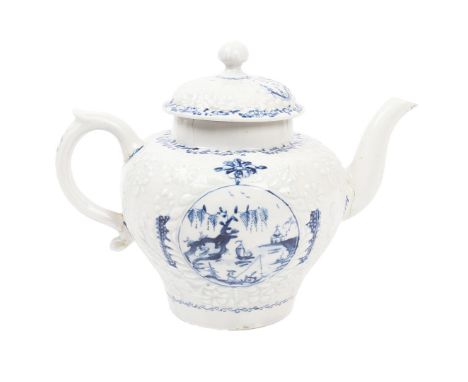 AN EXTREMELY RARE AND EARLY LOWESTOFT HUGHES TYPE RELIEF MOULDED TEAPOT, PRE 1760. With foliate and crisp relief moulded lid 
