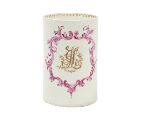 AN INSCRIBED LOWESTOFT PORCELAIN MUG, CIRCA 1775. the cylindrical body with puce scroll cartouche containing initials JL ,pro